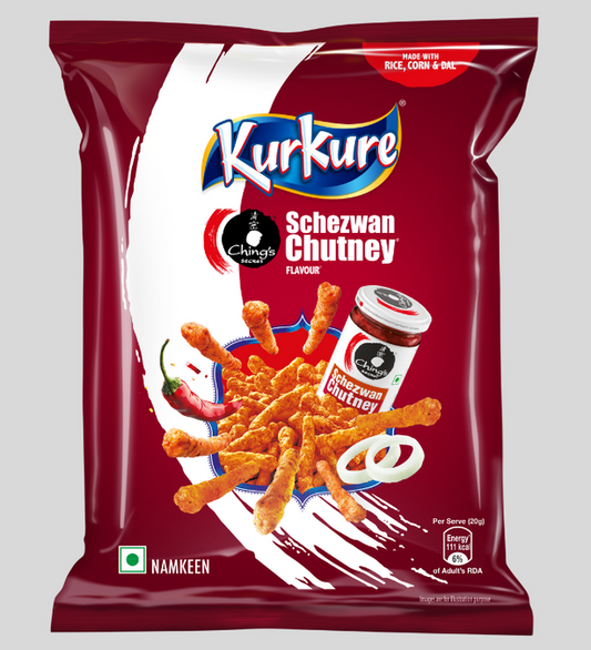 Kurkure Schezwan Chutney flavor packaging on a gray background
