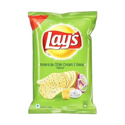 Green packet of Lay's American Style Cream & Onion Flavour chips on a white background